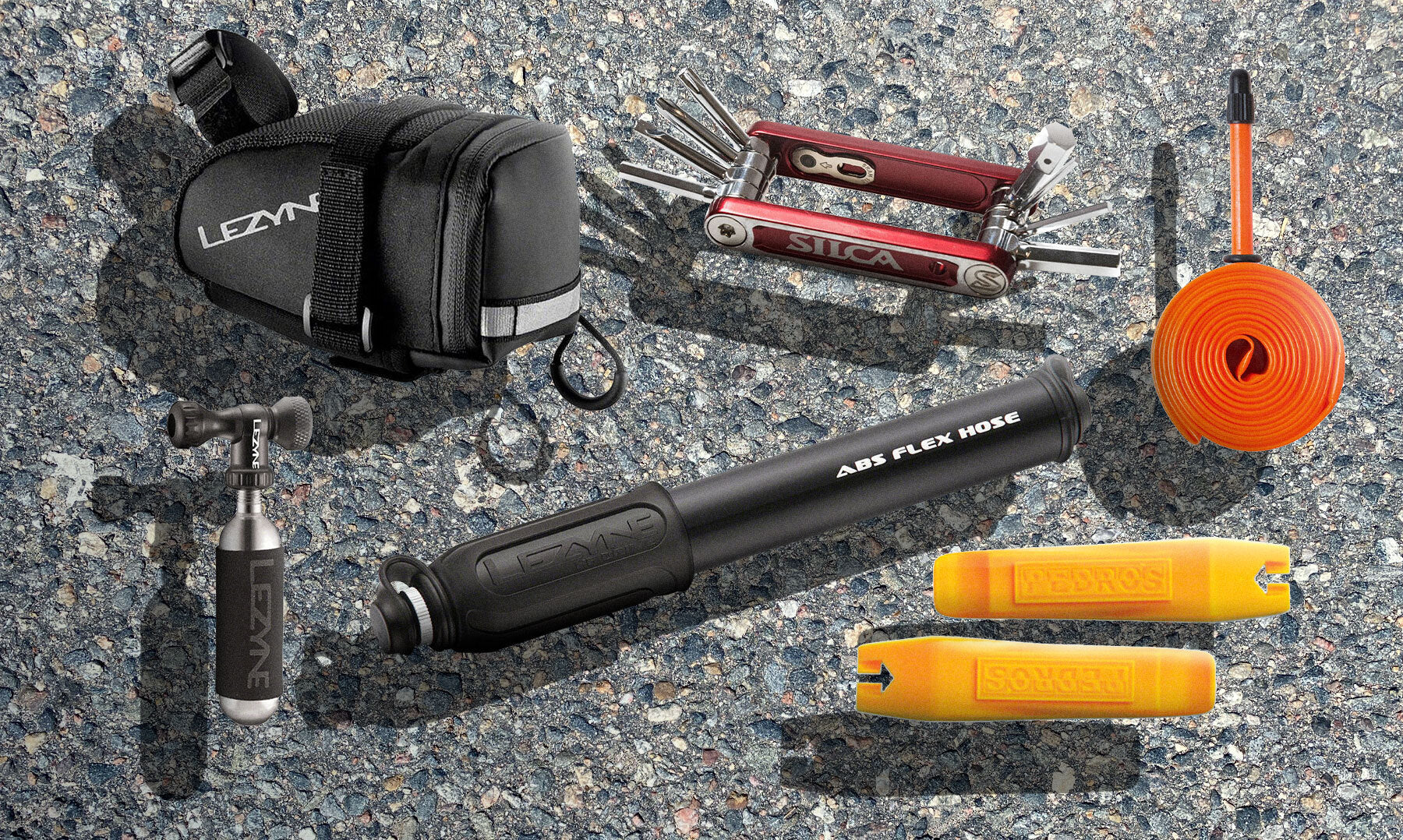 Road Bike flat tire repair essential tools, spares, and gear
